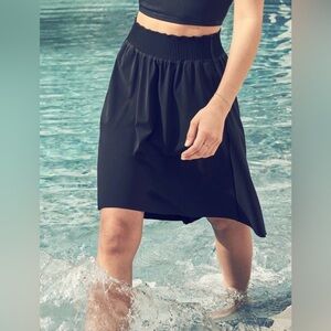 Athleta Cosmic Black Skirt (hi low) Performance fabric 
Size 1X packable new